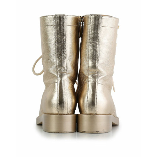 CHANEL Women's Boots Leather in Gold Size: EU 36