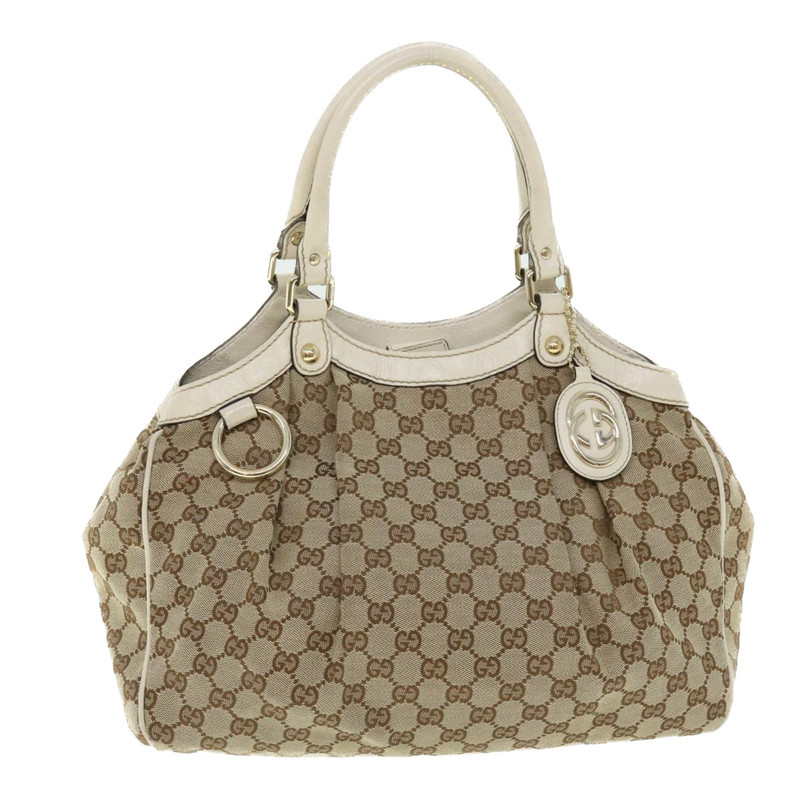 GUCCI Dames Handtas Canvas in Beige Tweedehands