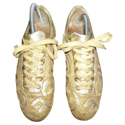 Dolce & Gabbana Sneakers aus Leder in Gold