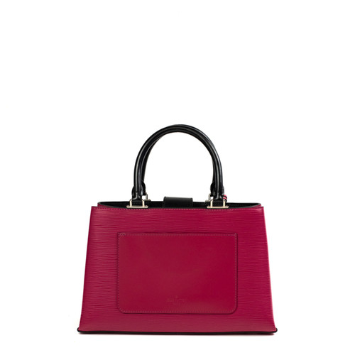 Vrouw Met Roze Louis Vuitton Lederen Tas En Blauwe Bloembroek Voor