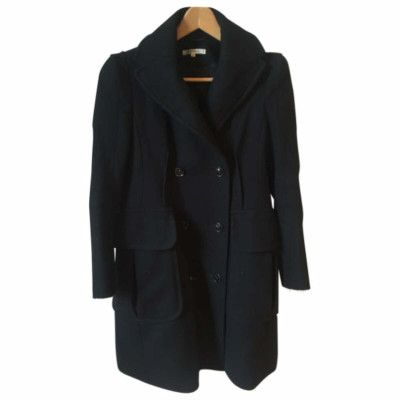 Carven Jacke/Mantel aus Wolle in Schwarz
