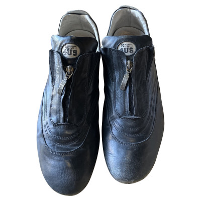 Cesare Paciotti Sneakers aus Leder in Schwarz