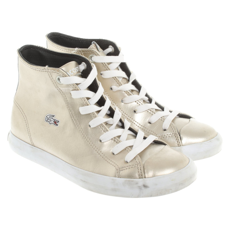 Lacoste Sneakers aus Leder in Gold