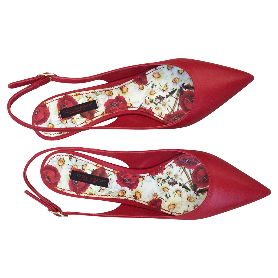 Dolce & Gabbana Pumps/Peeptoes aus Leder in Rot