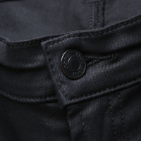 Hugo Boss Coated trousers in black