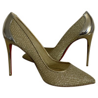 Christian Louboutin Pumps/Peeptoes Patent leather in Gold