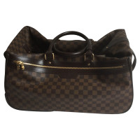 Louis Vuitton Duffle Leather in Brown