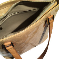 Louis Vuitton Beige patent leather bag .