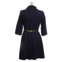 Milly Coat in dark blue with an interface