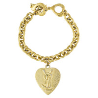 Yves Saint Laurent Gold colored bracelet with pendant