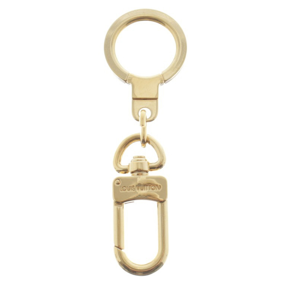 Louis Vuitton key case in gold