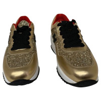 Hogan Sneakers aus Leder in Gold