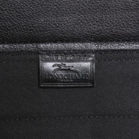 Longchamp Reisetasche aus Leder in Schwarz