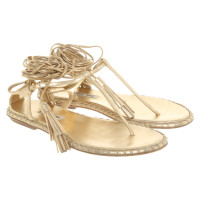 Miu Miu Sandalen aus Leder in Gold