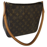 Louis Vuitton Umhängetasche aus Canvas in Braun