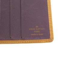 Louis Vuitton Sac à main/Portefeuille en Cuir en Jaune