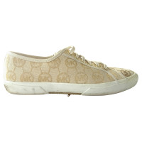 Michael Kors Sneakers aus Canvas in Gold