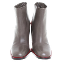 Jil Sander Ankle boots in taupe / red
