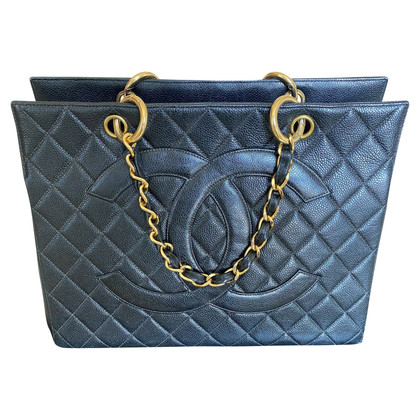 Chanel Grand  Shopping Tote Leer in Goud