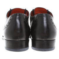 Santoni Chaussures à lacets en noir