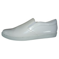Comme Des Garçons Sneakers aus Lackleder in Weiß