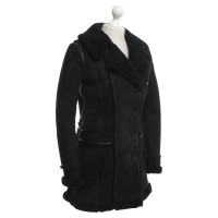 Balenciaga Manteau de fourrure en noir