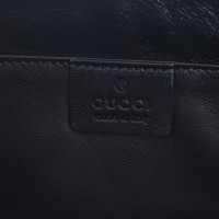 Gucci clutch con rifiniture in pelliccia