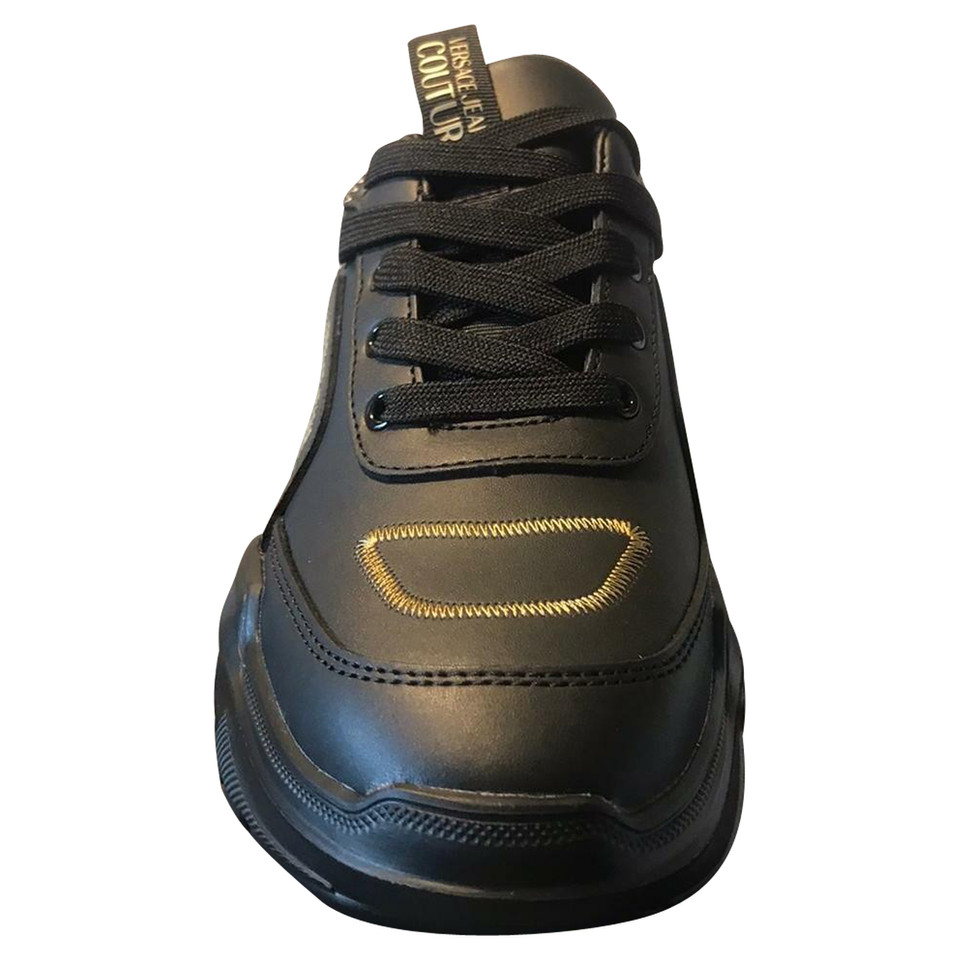 Versace Sneakers aus Leder in Schwarz