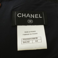 Chanel Marine blauw kostuum met logo knoppen