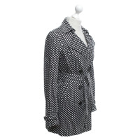 Vertigo Trench coat with polka dots