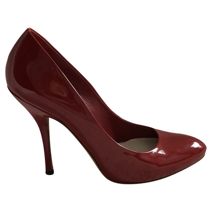 Gucci Pumps/Peeptoes Patent leather in Red