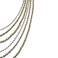 Christian Dior Asymmetrical chain.