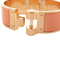 Hermès  Armband in Gold / Apricot