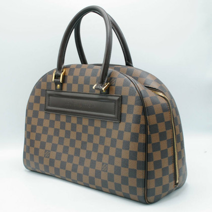 Louis Vuitton Nolita Leather in Brown