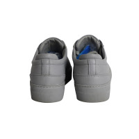 Axel Arigato Sneakers aus Leder in Grau
