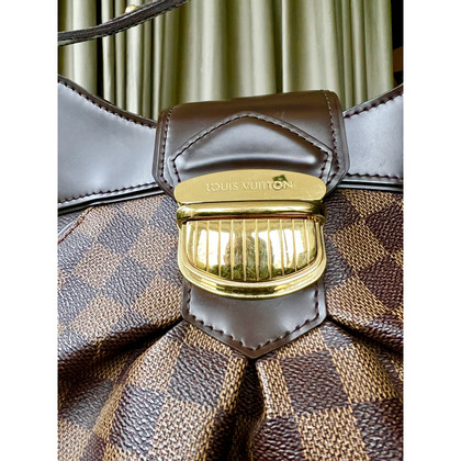 Louis Vuitton Sistina aus Leder in Braun