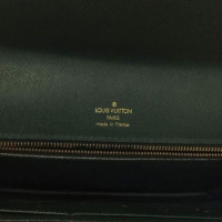 Louis Vuitton clutch Taiga Lederen