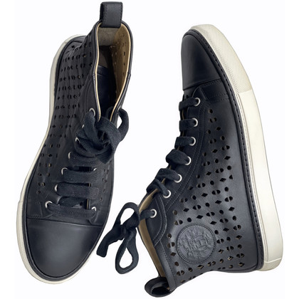 Hermès Sneakers aus Leder in Schwarz