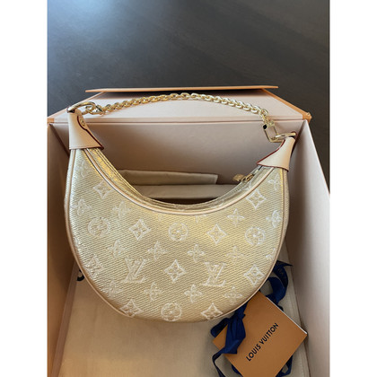 Louis Vuitton Loop Canvas in Gold