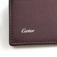 Cartier Täschchen/Portemonnaie aus Leder in Bordeaux
