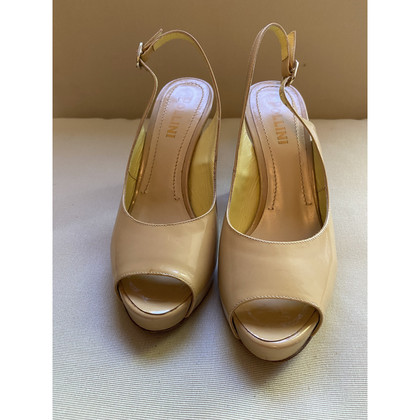 Pollini Pumps/Peeptoes Patent leather in Nude