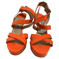 Jimmy Choo Sandalen aus Lackleder in Orange