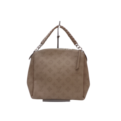 Louis Vuitton Babylone Mahina Leather in Beige