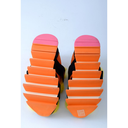 Dolce & Gabbana Sneakers aus Leder in Orange