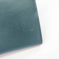 Yves Saint Laurent Täschchen/Portemonnaie aus Leder in Grün