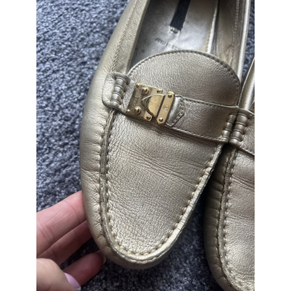 Louis Vuitton Slippers/Ballerinas Leather in Gold