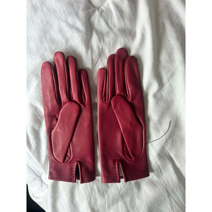 Hermès Handschoenen Leer in Roze