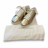 Jimmy Choo Sneakers aus Leder in Gold