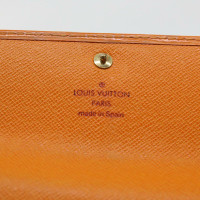 Louis Vuitton Sac à main/Portefeuille en Cuir en Ocre