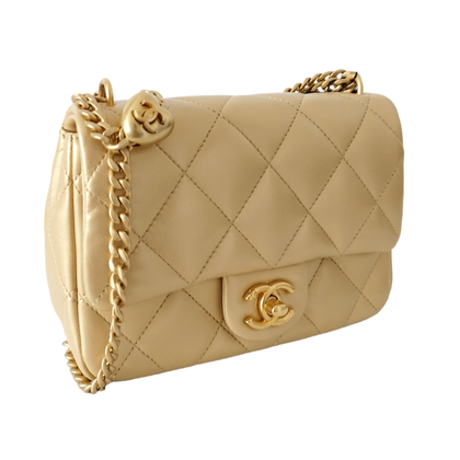 Chanel Flap Bag Mini in Pelle in Oro
